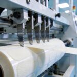 Precision die-cut industrial adhesive tape parts with clean edges in an ISO 7 cleanroom